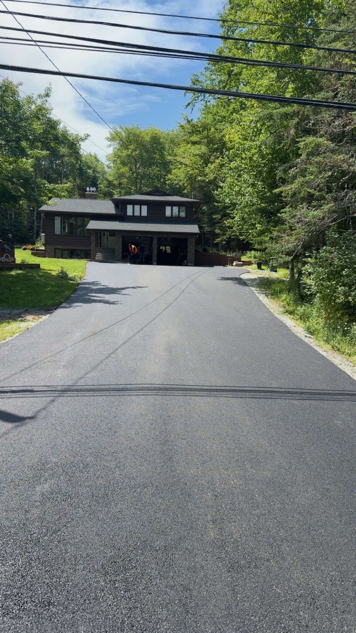 Fresh residential asphalt driveway completed by Empire Paving